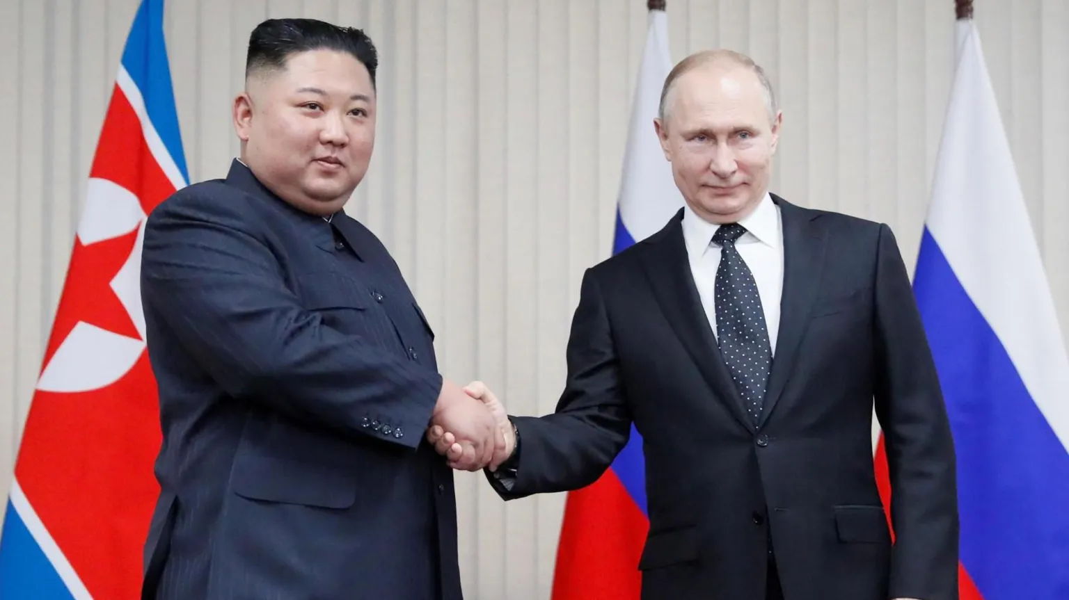 Vladimir Putin and Kim Jong Un